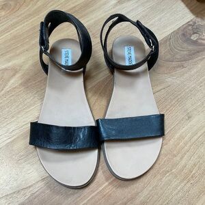Steve Madden soft flat sandals. Used one season approximately worn 15 times.